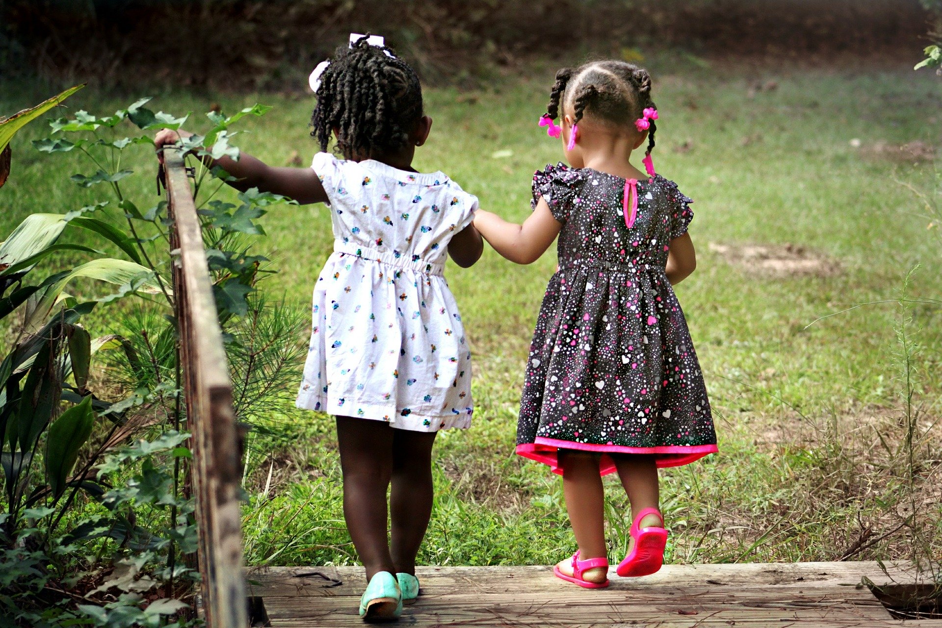 two little girls developing social skills