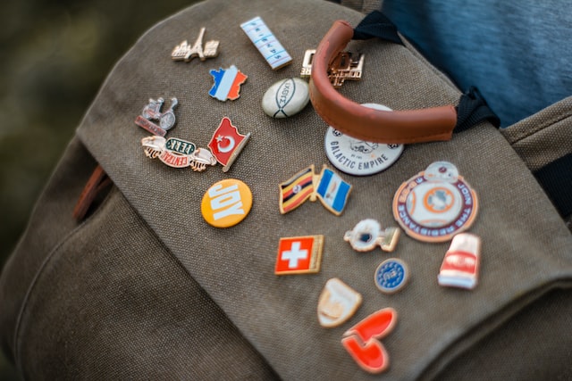 Why Do Companies Use Lapel Pin Badges to Market their Brands? - Sheeba  Magazine