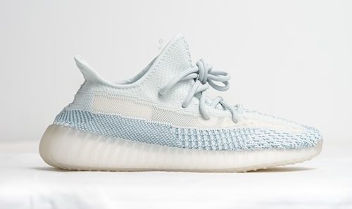 white Adidas Yeezy sneakers